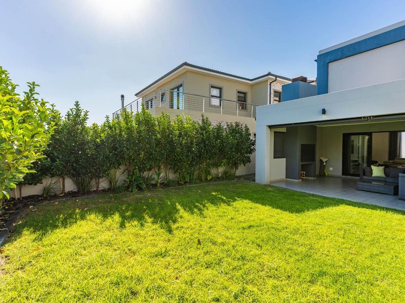 Spacious Family Living in Prestigious Sagewood Security Estate - Photo 10