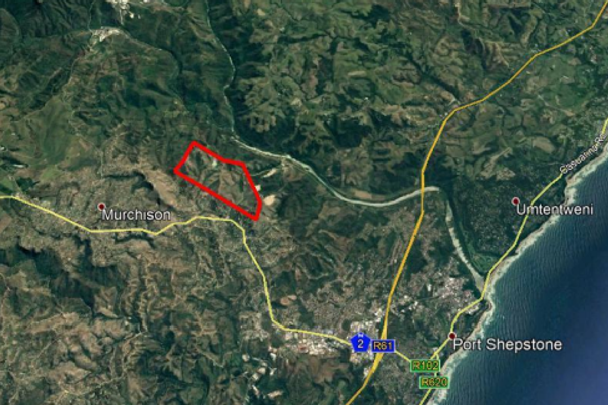 An aerial satellite view showing the location and boundaries of the farm property relative to surrounding regional infrastructure and coastal towns.