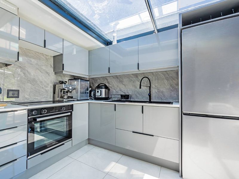 Striking Modern Family Home with Designer Finishes and Effortless Entertaining in Prime Panorama - Photo 9