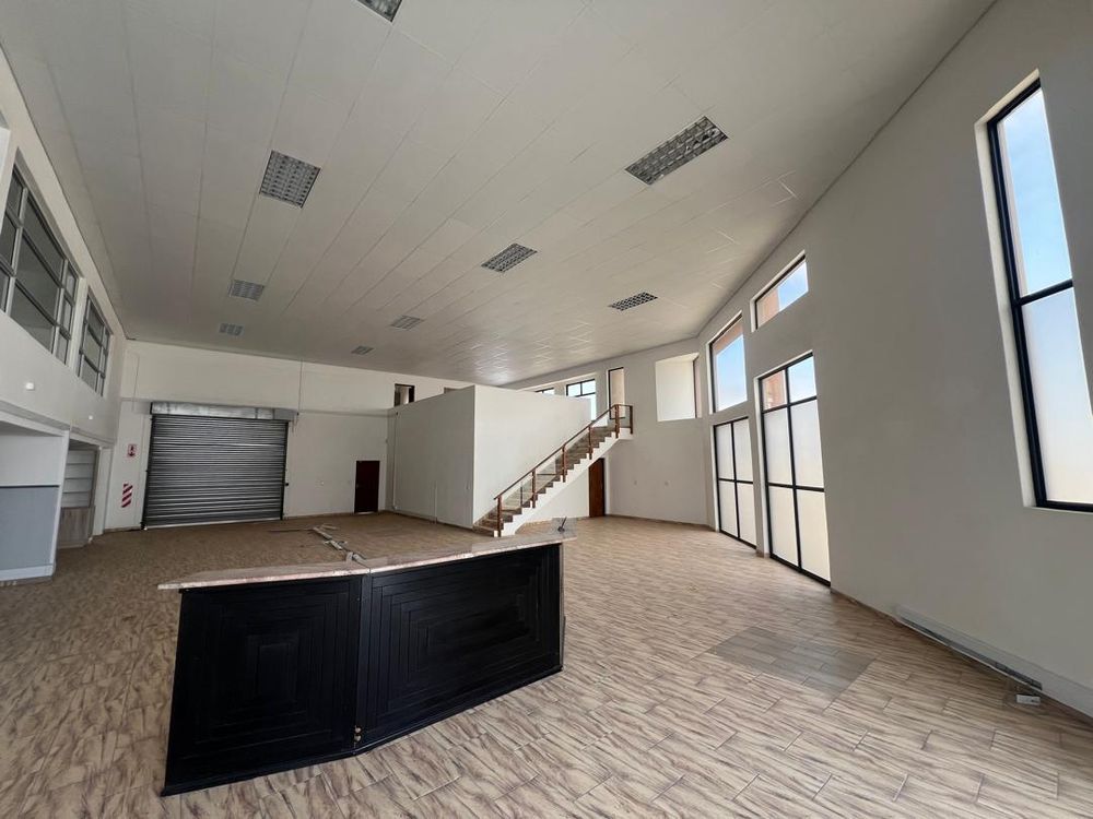 Main entrance reception area, offices and upstairs entertainment area