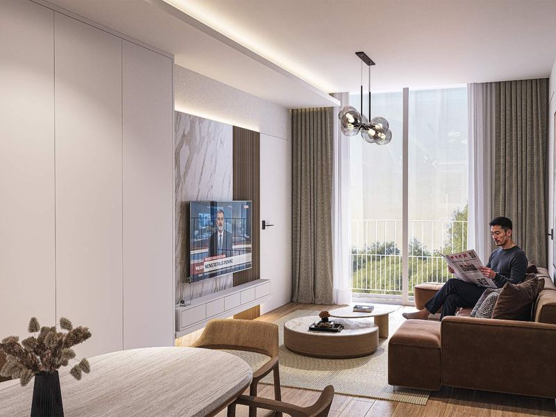 Modern living room featuring a marble accent wall, integrated cabinetry, recessed lighting, and large windows providing natural light and access to the balcony.