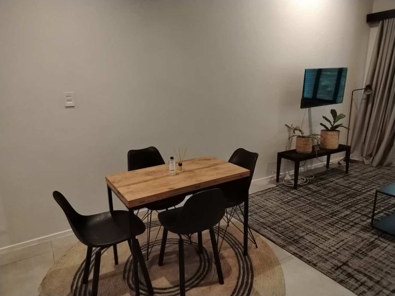 Stylish 1-Bedroom Apartment in the Prestigious Black Brick Building, Sandton - Photo 10