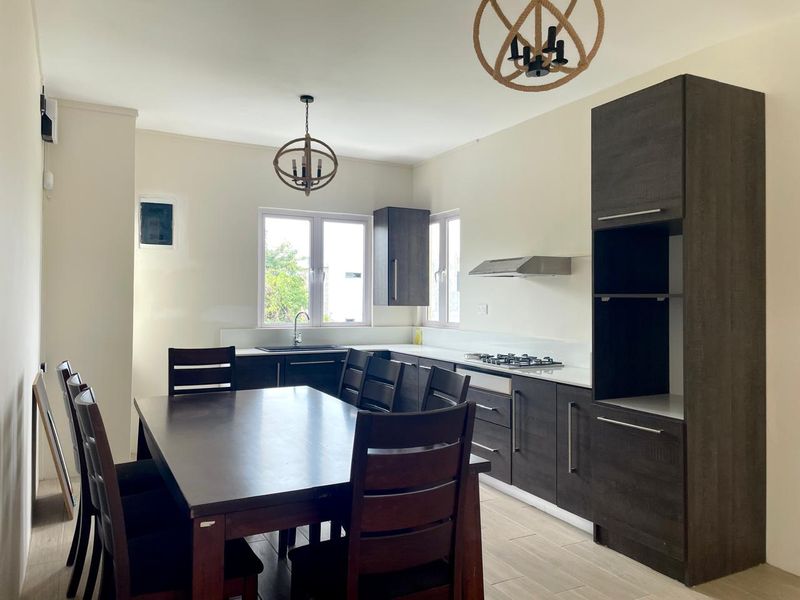 An Exceptional Villa with Outstanding Potential, Blending Contemporary Elegance and Tropical Living - Photo 2