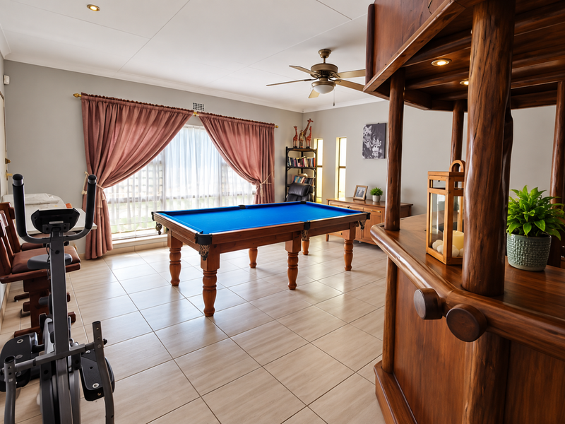Spacious living area featuring tiled flooring, recessed lighting, a ceiling fan, and a built-in wooden bar structure.