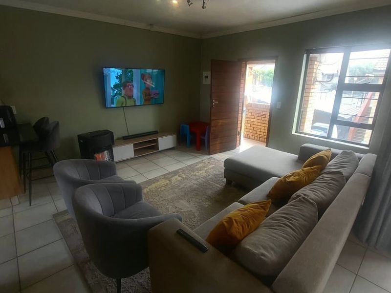 Modern 2-Bedroom Home with Open-Plan Living & Balcony - Photo 3
