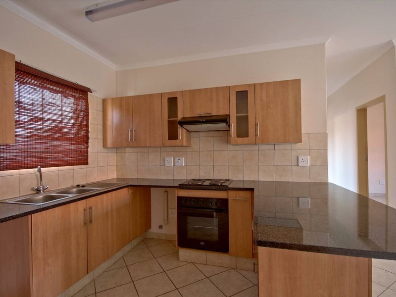 Prime Location! Modern Apartment with 24/7 Security! - Photo 2