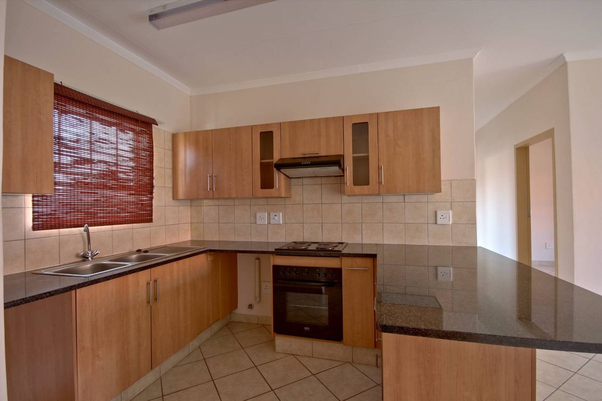 Prime Location! Modern Apartment with 24/7 Security! - Photo 2