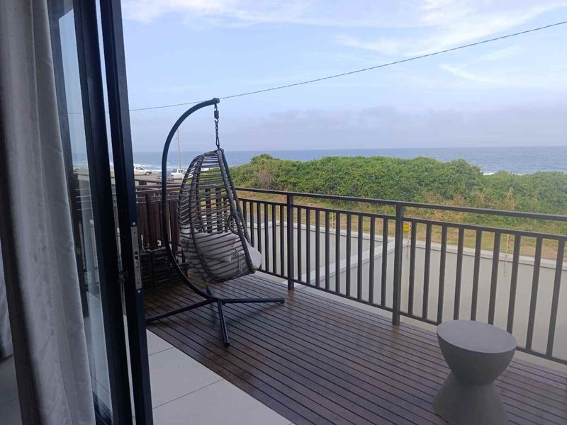 BEACHFRONT BLISS | FULLY FURNISHED 2-BEDROOM APARTMENT FOR RENT - Photo 4