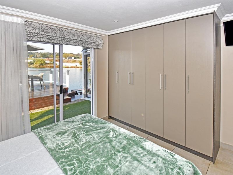 Tranquil Waterfront-Front Living in Secure Leisure Bay Estate - Photo 9