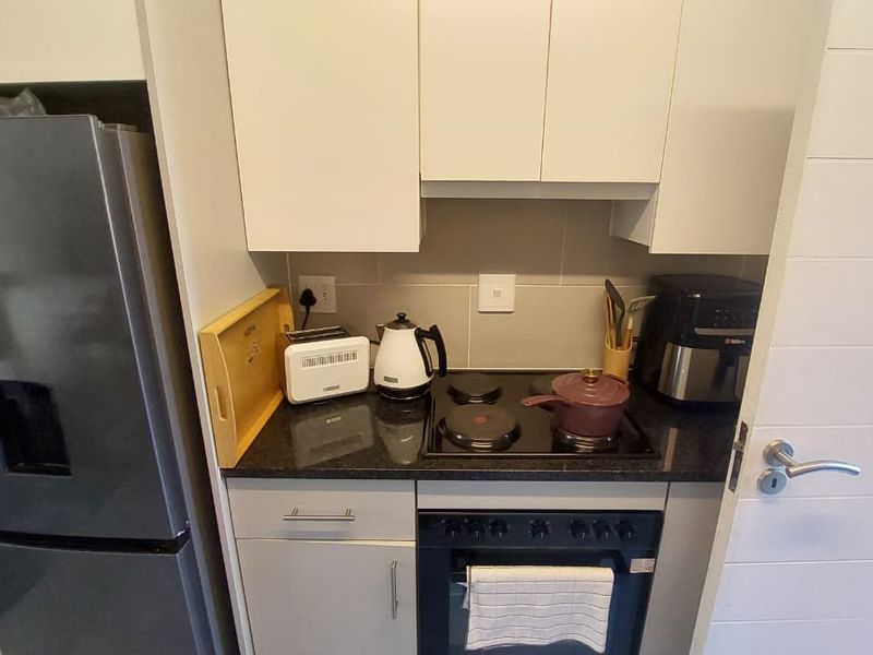 Cozy 2-Bed Ground-Floor Unit with Private Patio & Storage - Photo 2