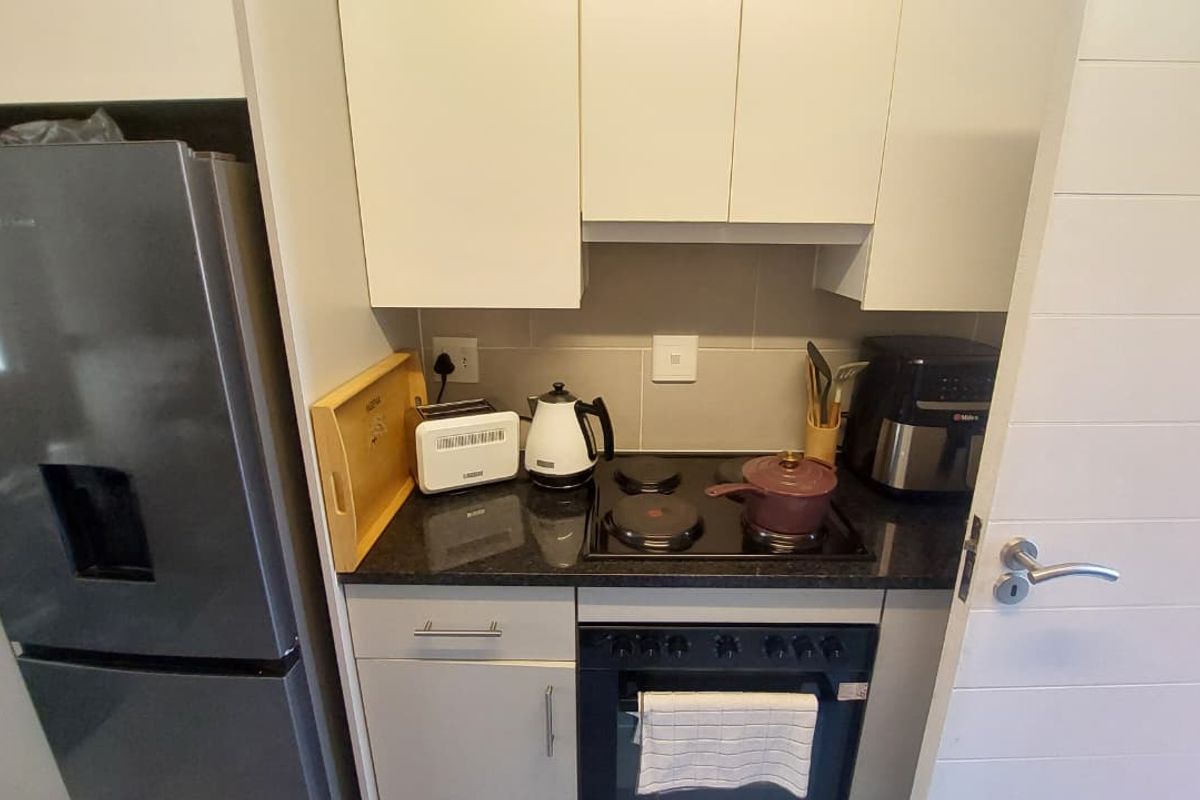 Cozy 2-Bed Ground-Floor Unit with Private Patio & Storage - Photo 2