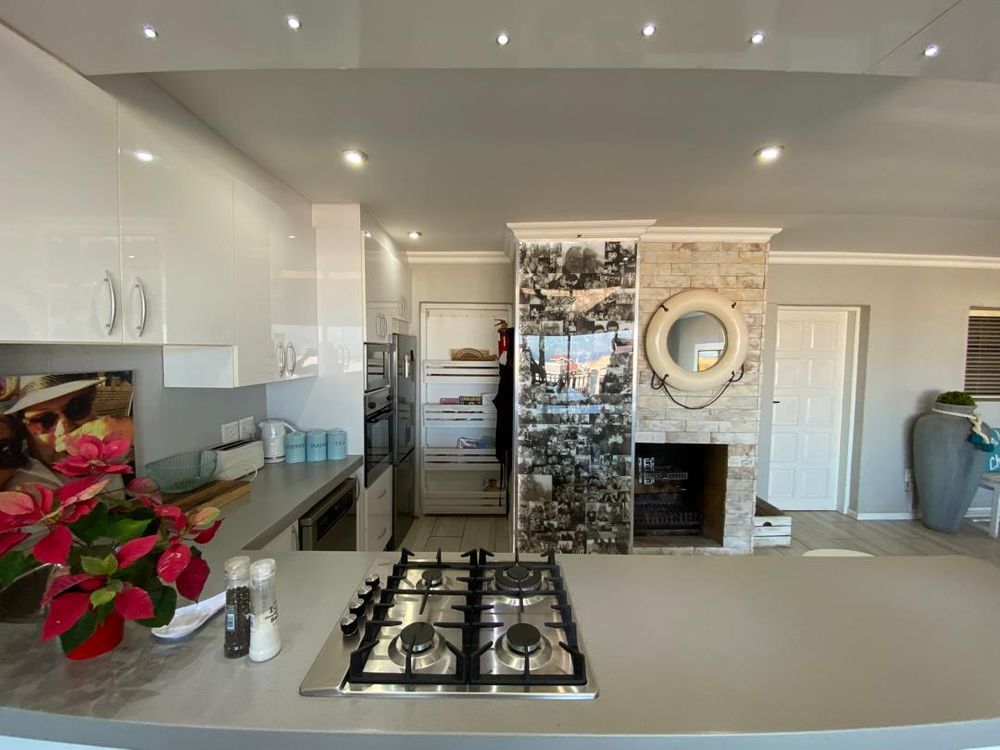 First floor open-plan lounge, kitchen and lounge with balcony