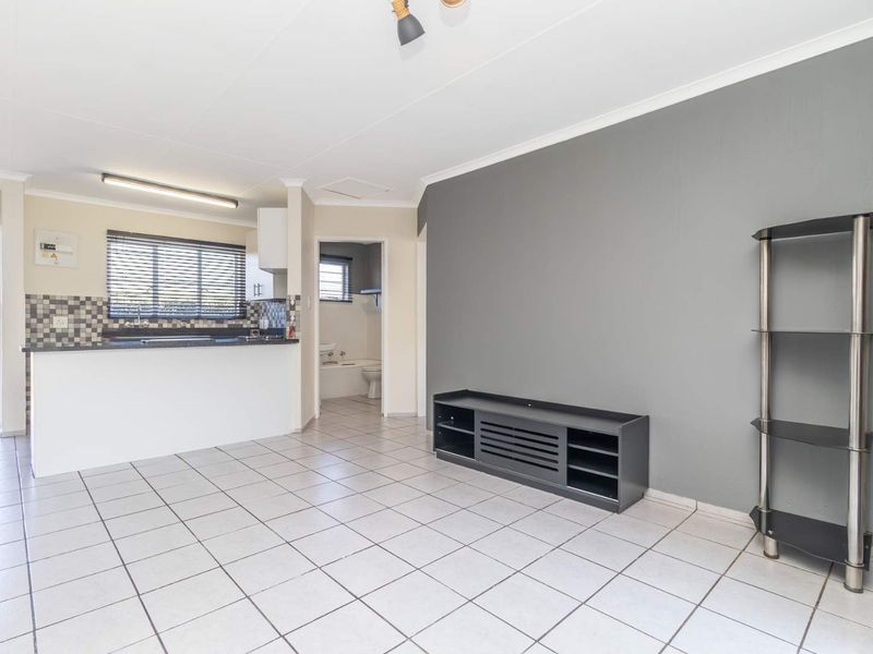 Spacious 1 Bedroom Townhouse with Expansive Private Garden | Sunrock Village Gem - Photo 4