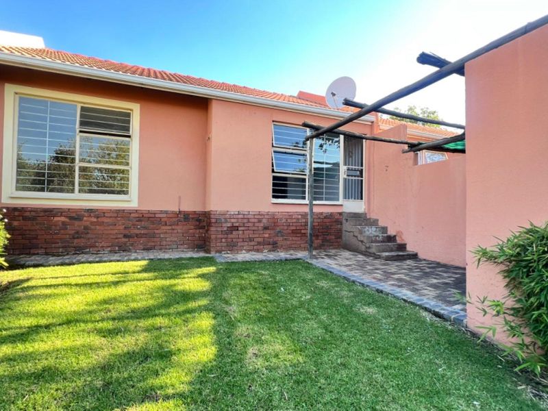 Rent-to-Own Serene Oasis with Manicured Garden Views" - Photo 2