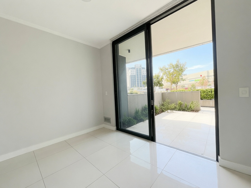 Luxury Ground-Floor Living with Expansive Patio at Ellipse Waterfall - Photo 8