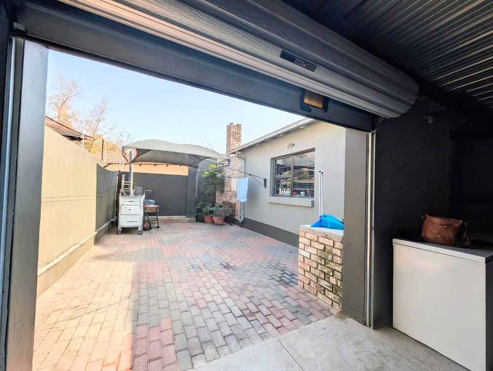 Back yard through the double garage 