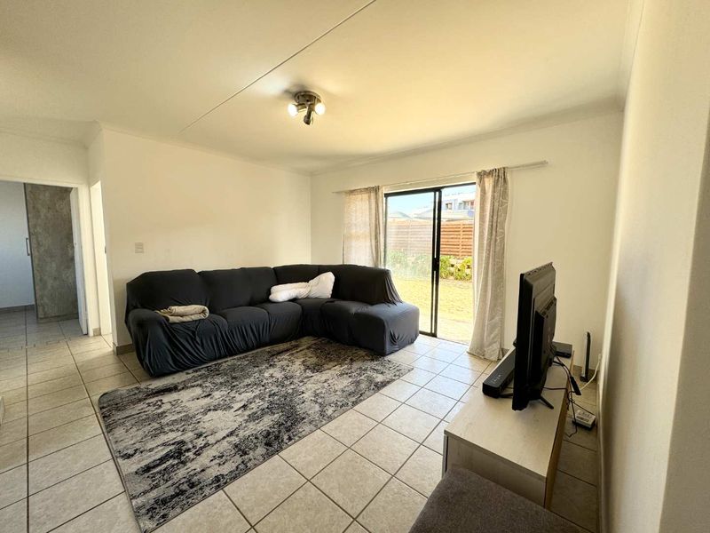 Modern 4-Bedroom Townhouse in Sagewood—Garden Oasis Awaits - Photo 2