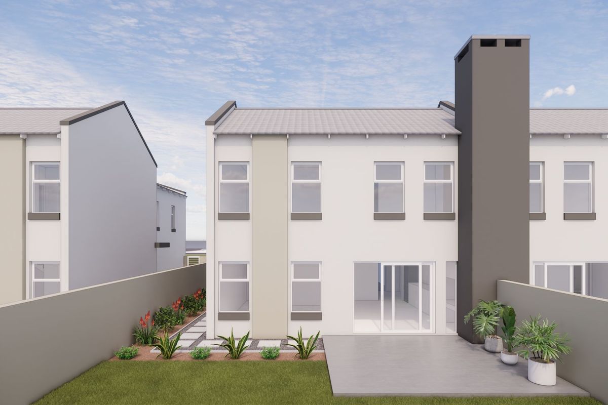 Rear view of a modern townhouse featuring a concrete patio, sliding glass doors, and a prominent chimney stack within a private garden setting.