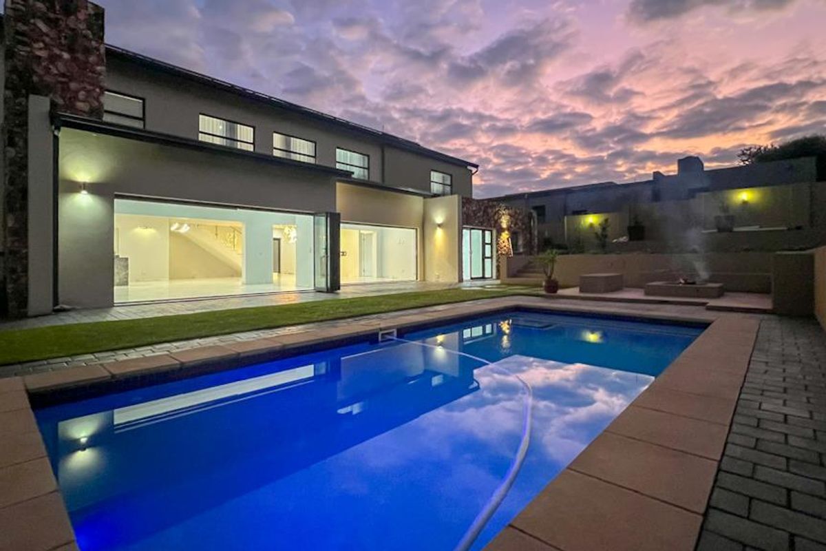 Hilltop Haven | Modern Multi-Level Marvel with Solar Power, Blueline Kitchen & Entertainer’s Garden - Photo 5