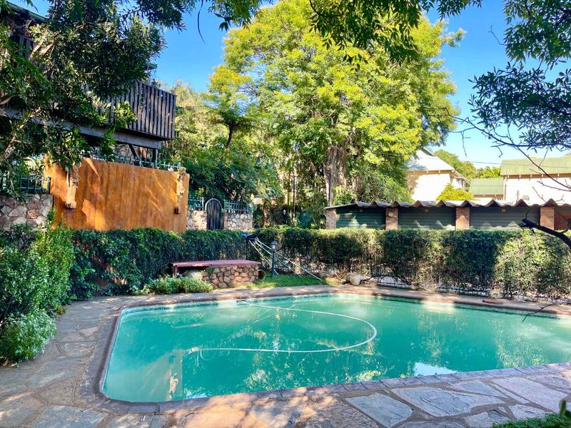 Comfy Townhouse in Lush Complex - Photo 2