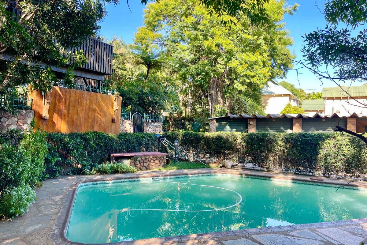 Comfy Townhouse in Lush Complex - Photo 2