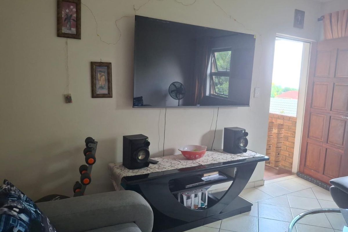 Secure solar powered two bedroom home featuring a built-in braai - Photo 5