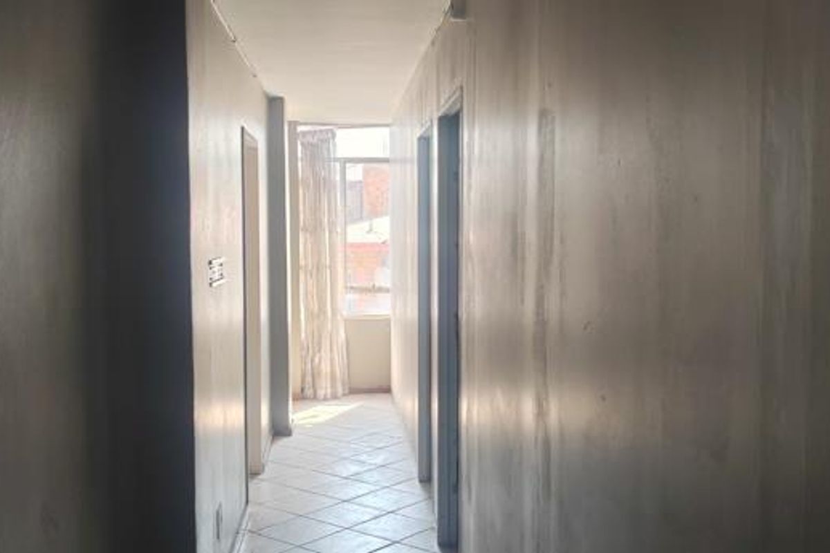 Unlock Potential in This Spacious 3-Bedroom Apartment - Photo 4