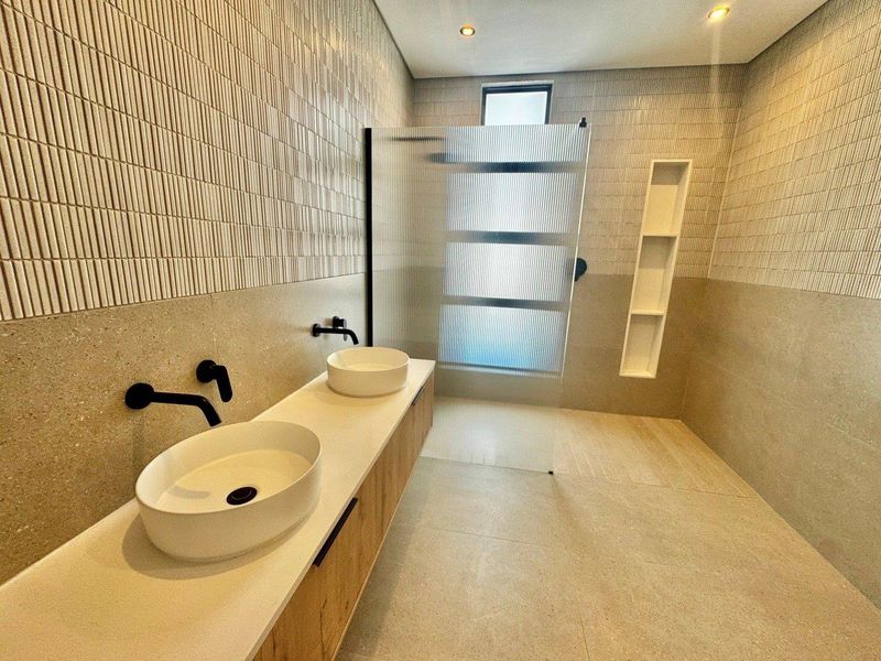 Welcome to a brand-new masterpiece in the highly sought-after suburb of Sandown – where luxury, comfort, and contemporary elegance come together effortlessly. V - Photo 1