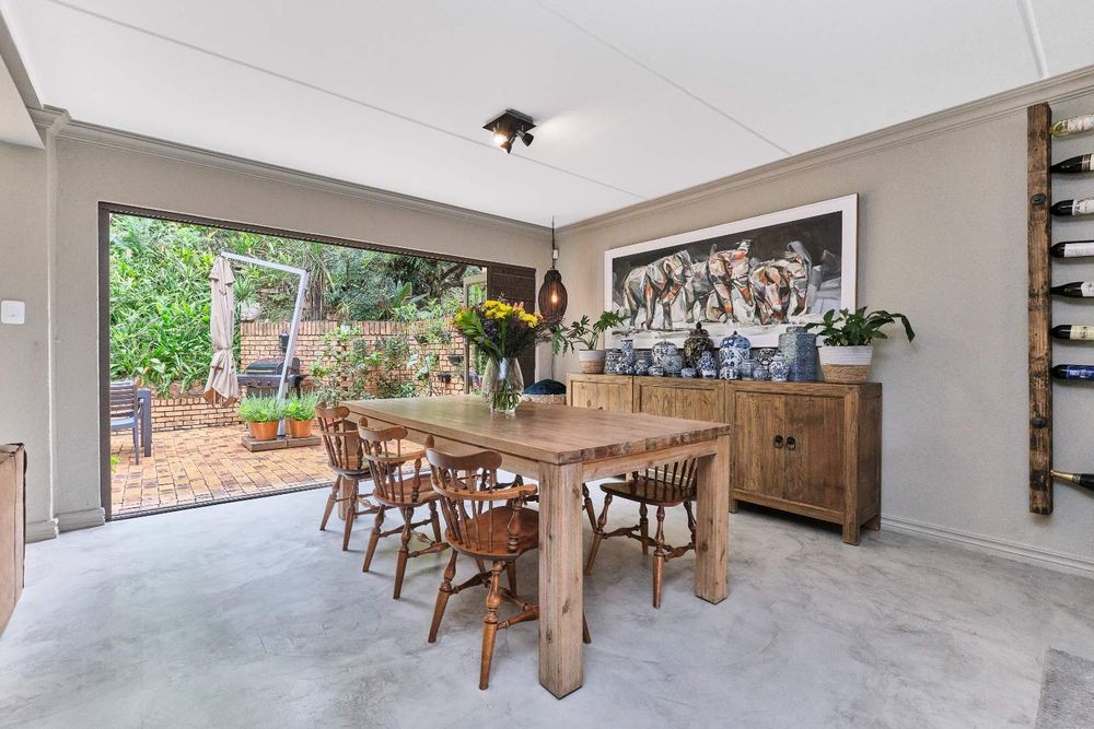 Dining area with stacking doors to the garden.