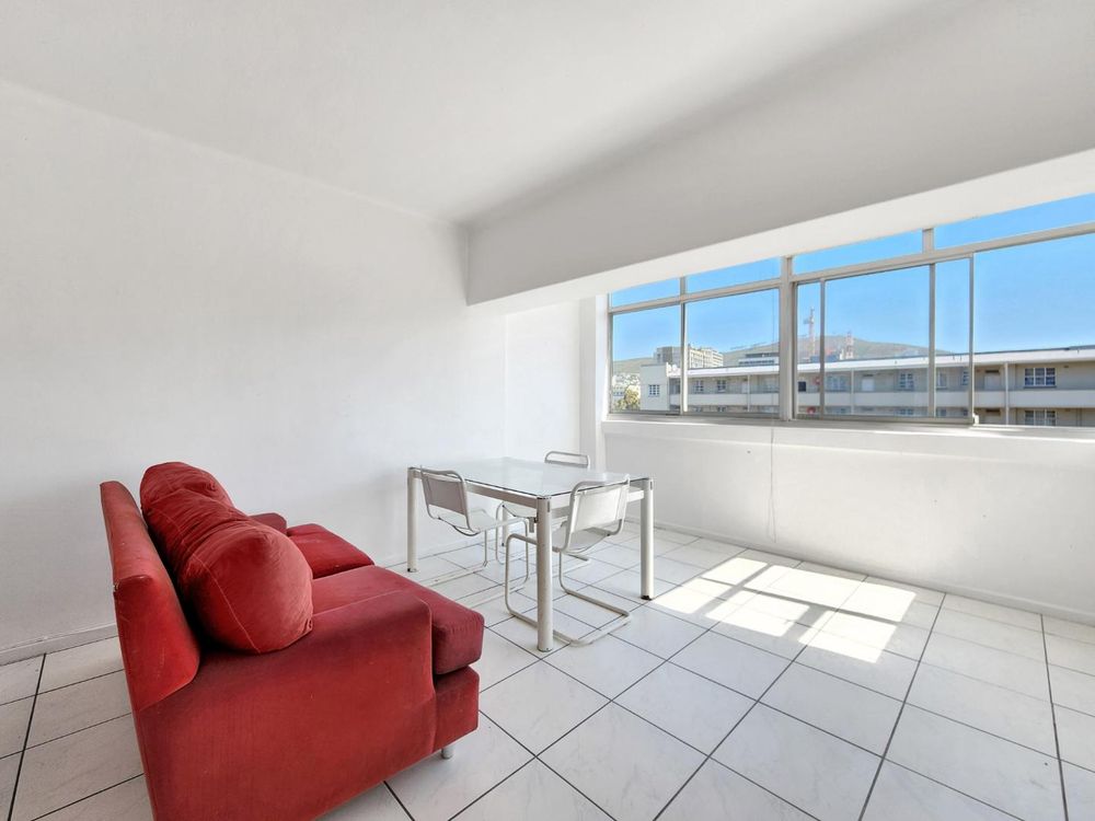 Lounge / dining room with Signal Hill views
