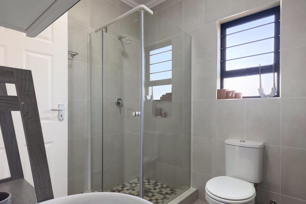 Family bathroom with shower.