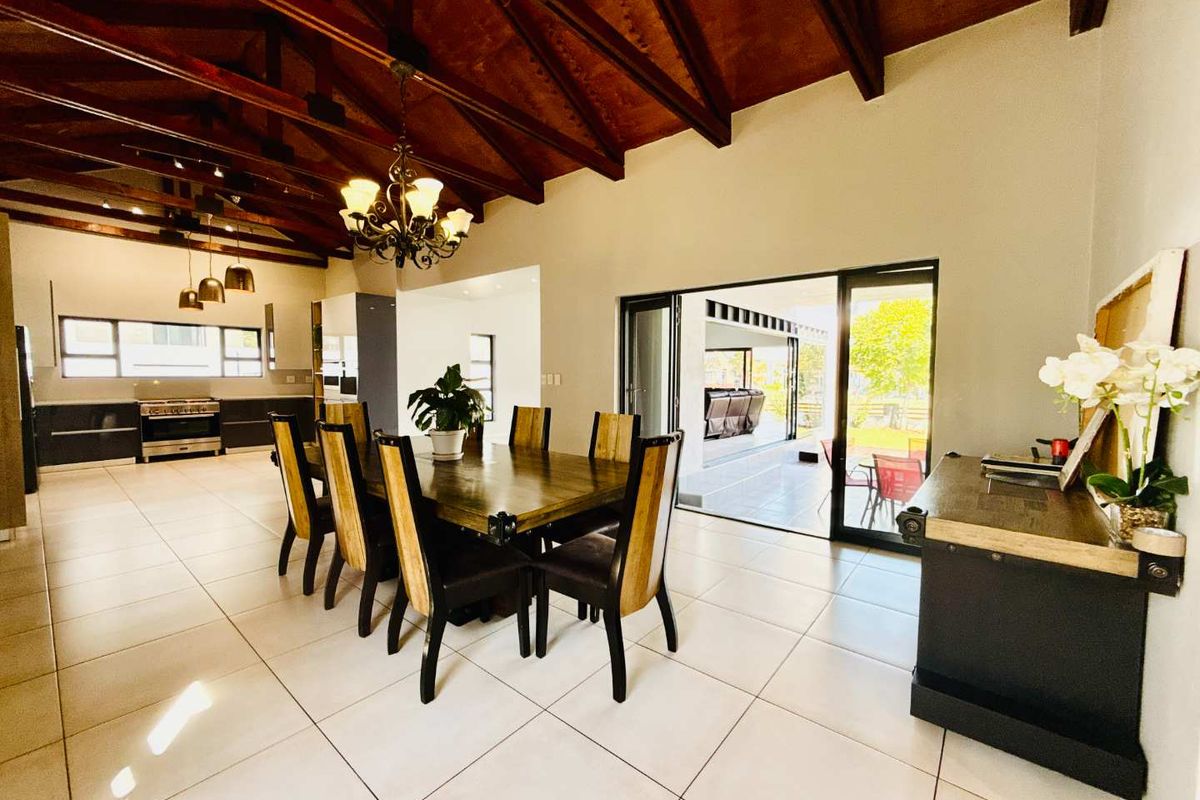 Modern Single-Level Family Home on the Green Belt in Copperleaf Golf Estate - Photo 3