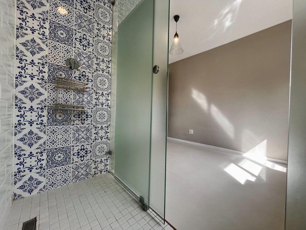 En Suite Shower in Sunny Kissed Second Bedroom