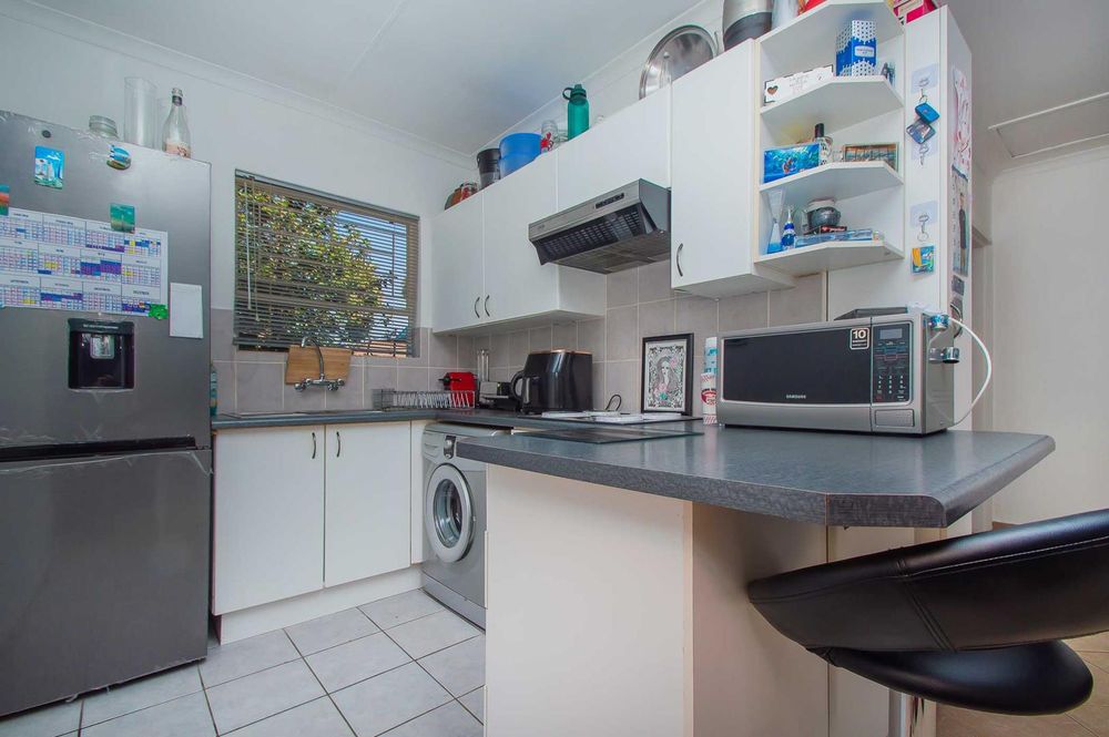 Well planned kitchen with ample cupboards