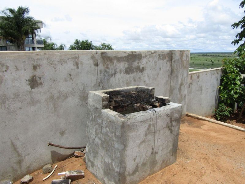 1 x 6 BEDROOM DOUBLE-STOREY HOUSE & 8 x 2 BEDROOM FLATS FOR SALE IN RUNDU: - Photo 5