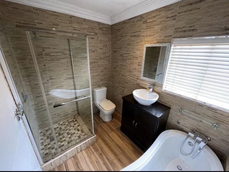 Beautifully Renovated & Well-Maintained 2-Bedroom Duplex with Private Pool, Patio & Built-In Braai - Photo 10