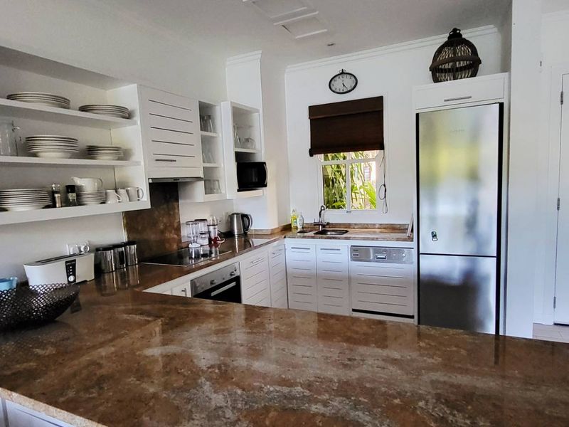 EXCEPTIONAL GROUND FLOOR EDEN ISLAND GARDEN UNIT - Photo 5