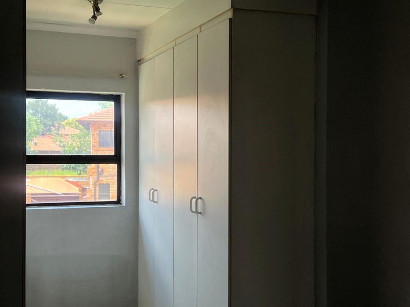 This lock up and go duplex unit is up for grabs in a lovely quiet security complex and facebrick as well. - Photo 9