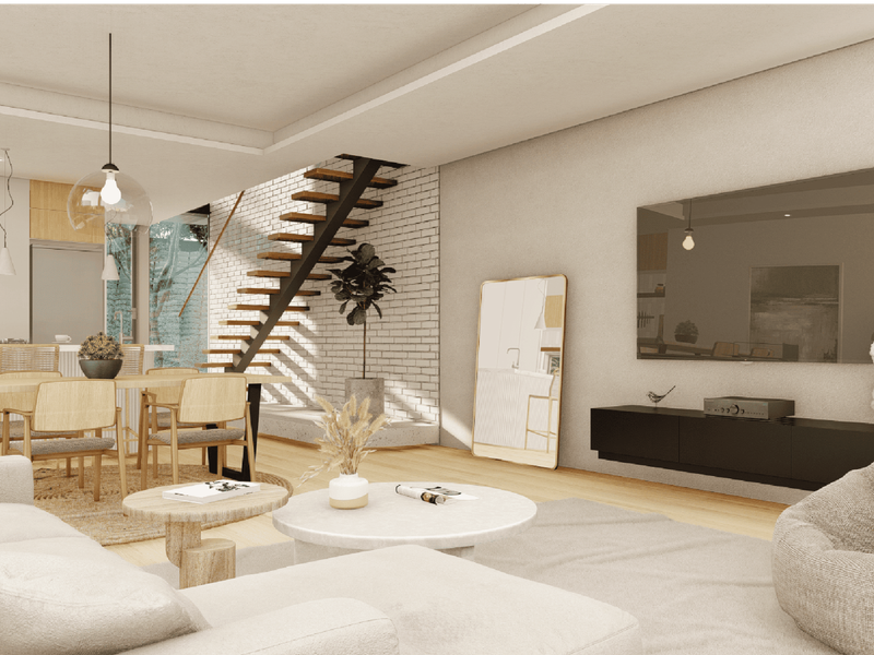 A modern open-plan living and dining area featuring a striking floating staircase, exposed brick feature wall, and sleek built-in media cabinetry.