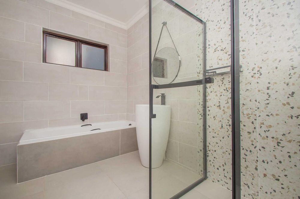 Custom designed bathroom with clean modern finishes