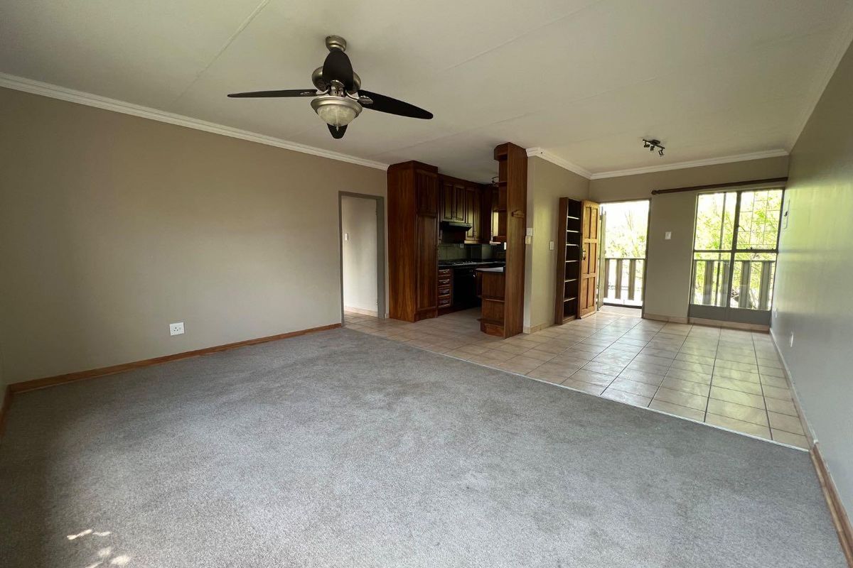 Spacious 2-Bedroom Second-Floor Apartment in a Secure and Well-Maintained Complex - Photo 3