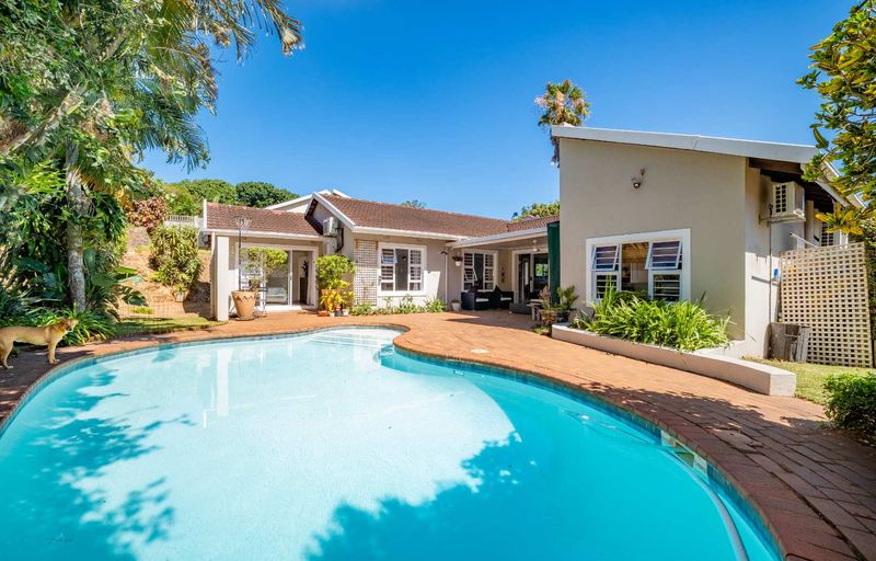 Four-Bedroom Family Home with Pool in Sunningdale