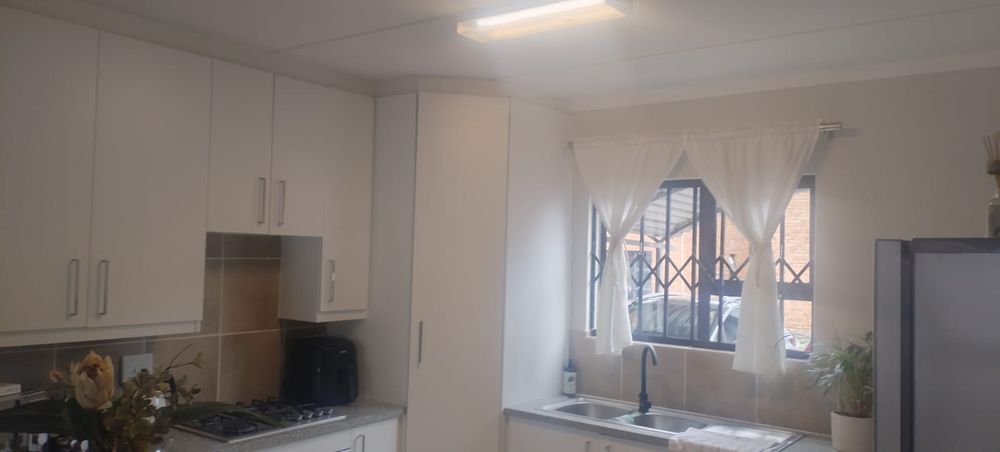 Kitchen grocery cupboard, double bowl sink 