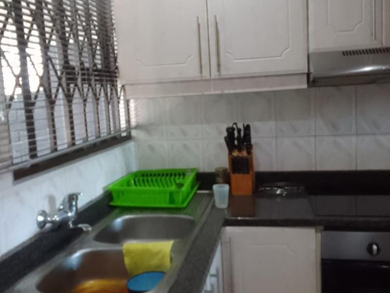 Cozy 3-Bedroom Home with Carport, Satellite Dish, and Comfortable Living Spaces - Photo 2