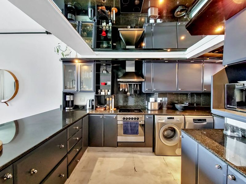 Entertain in Style: Spacious Penthouse with Pool & Views - Photo 4