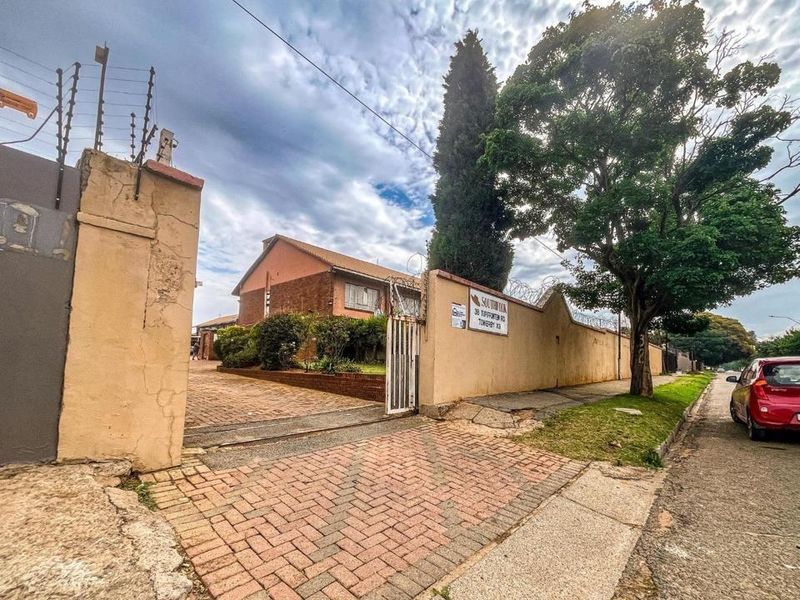 Experience Secure Modern Comfort in This Expansive Towerby Duplex - Photo 3