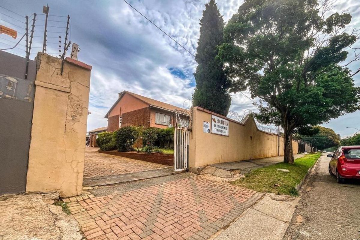 Experience Secure Modern Comfort in This Expansive Towerby Duplex - Photo 3