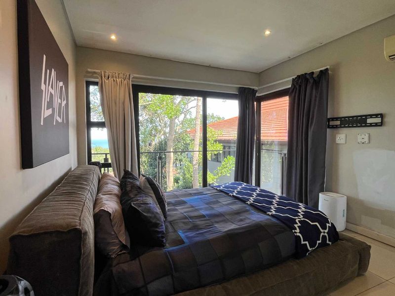 Charming 3-Bedroom Duplex in Zimbali with  Distant Sea Views - Photo 10