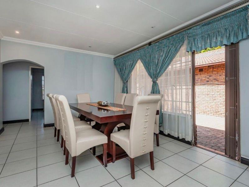 Exceptional 4-Bedroom Family Home with 2 Cottages, Income Potential & Entertainment Paradise for Sale in Germiston - Photo 9