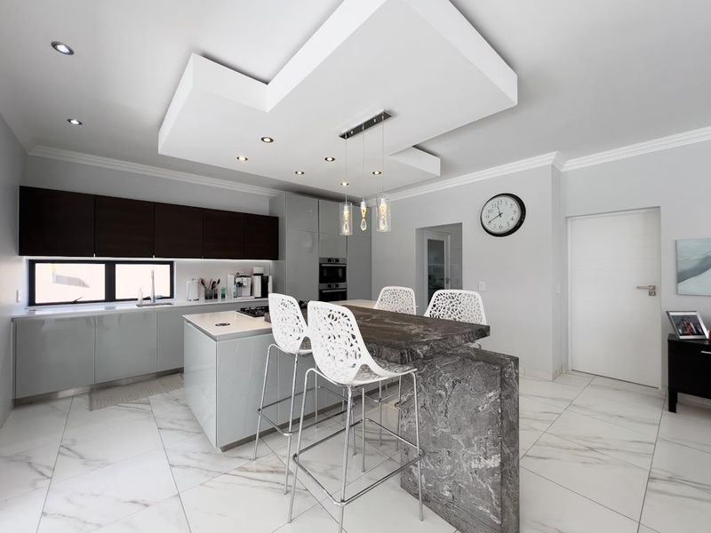 Hilltop Haven | Modern Multi-Level Marvel with Solar Power, Blueline Kitchen & Entertainer’s Garden - Photo 4